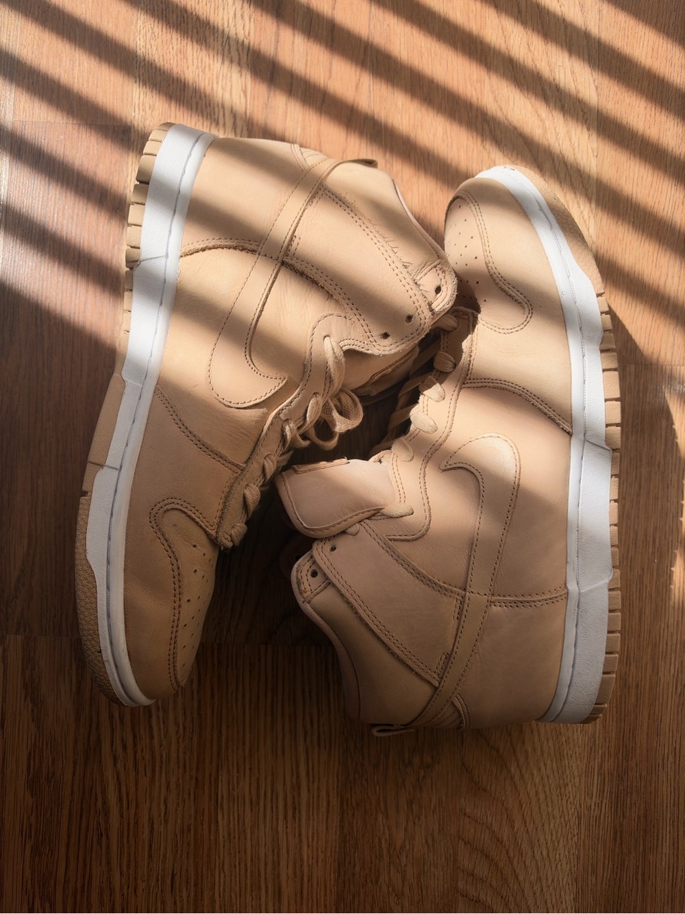 Nike Woman's High-Top Sneakers in Tan and White (9.5 Women’s size)